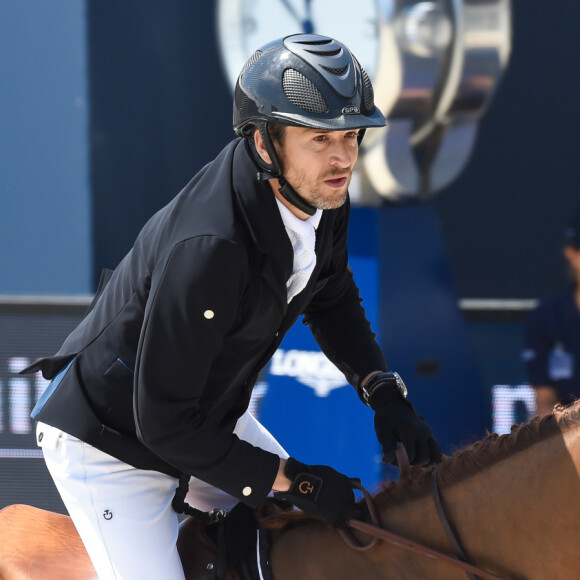 Avant d'être acteur et réalisateur, Guillaume Canet était un passionné d'équitation
Guillaume Canet - Pour la cinquième année consécutive, le Longines Athina Onassis Horse Show ("LAOHS"), s'installe sur la mythique plage de Pampelonne, située sur la Presqu'île de Saint-Tropez. Cet évènement d'exception est orchestré par la célèbre cavalière Athina Onassis © Lionel Urman / Bestimage