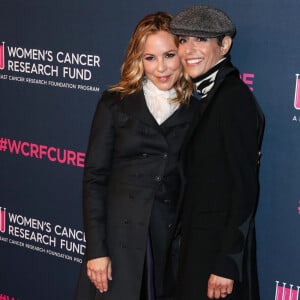 Maria Bello et Dominique Crenn au photocall de la soirée "Women's Cancer Research Fund" à Los Angeles, le 27 février 2020. 