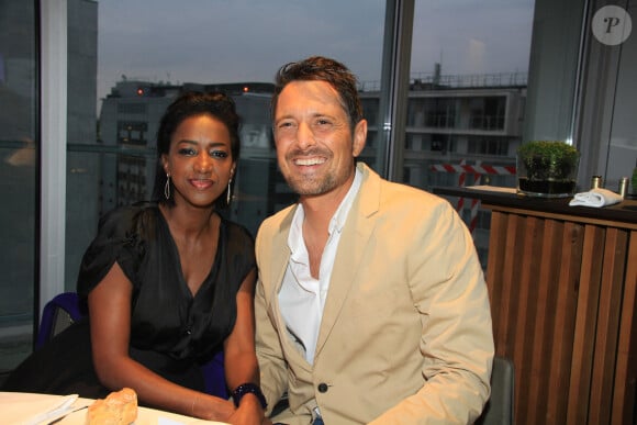 Exclusif - Hapsatou Sy et son mari Vincent Cerruti - Le Grand Dîner du 14 juillet, sur le rooftop de l'hôtel Pullman Tour Eiffel à Paris, France, le 14 juillet 2021. © Philippe Baldini/Bestimage