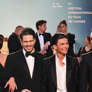 François Civil, Malik Frikah, Gilles Lellouche - Descente des marches du film " L'amour ouf " lors du 77ème Festival International du Film de Cannes, au Palais des Festivals à Cannes. Le 23 mai 2024 © Bruno Bebert / Bestimage