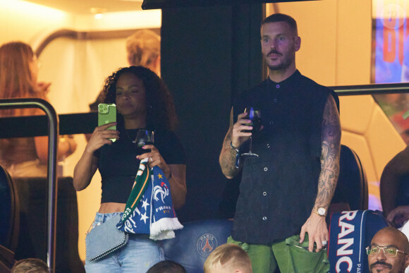 Christina Milian et son mari M. Pokora (Matt Pokora) - Match amical - France - Irlande (2-0) lors des matchs qualificatifs à l'Euro 2024 au Parc des Prince à Paris le 7 septembre 2023. © Cyril Moreau/Bestimage