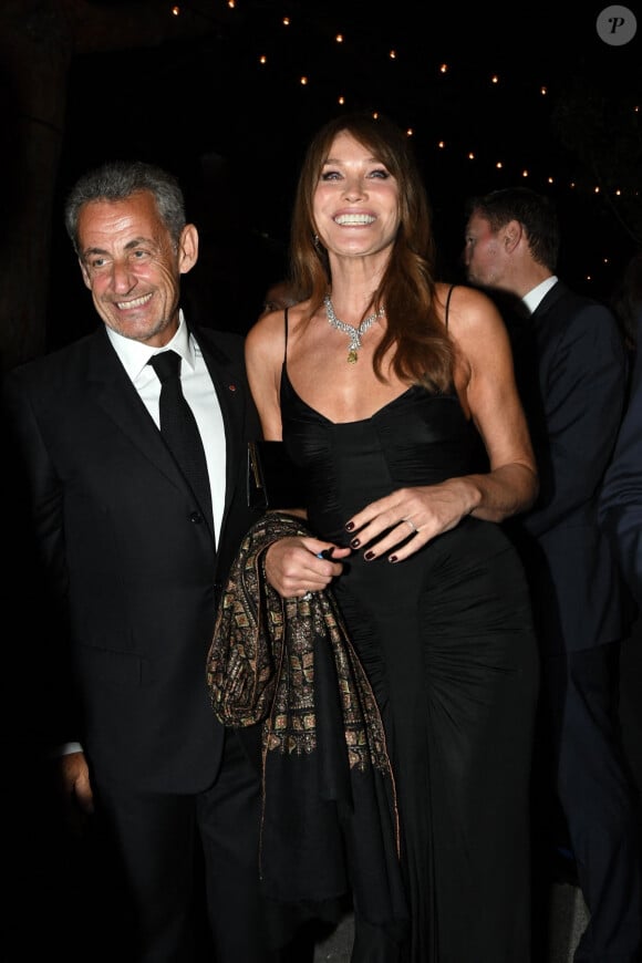 Carla Bruni et son mari Nicolas Sarkozy à la soirée "Women In Motion" par Kering au Château de la Castre lors du 75ème Festival International du Film de Cannes, le 22 mai 2022. 