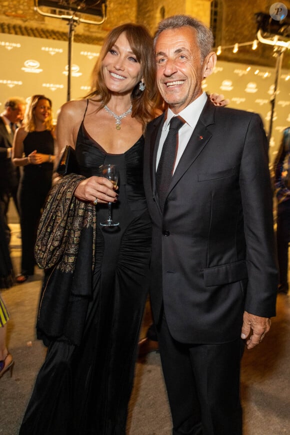 Carla Bruni et son mari Nicolas Sarkozy - Personnalités à la soirée "Women In Motion" par Kering au Château de la Castre lors du 75ème Festival International du Film de Cannes. Le 22 mai 2022 © Olivier Borde / Bestimage 