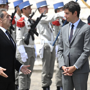 Nicolas Sarkozy et le Premier ministre Gabriel Attal - Cérémonie à l'Arc de Triomphe à Paris, à l'occasion du voyage officiel du président des Etats-Unis en France. Le 8 juin 2024 © Jeanne Accorsini / Pool / Bestimage 