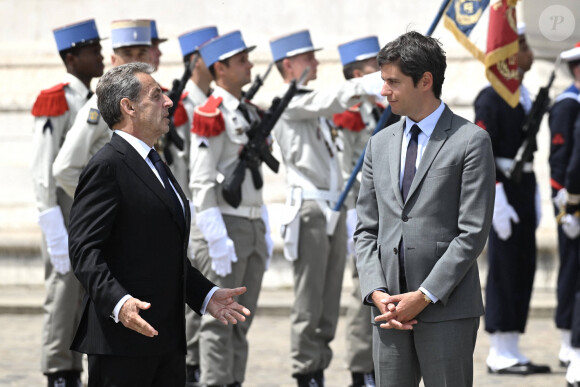 Nicolas Sarkozy et le Premier ministre Gabriel Attal - Cérémonie à l'Arc de Triomphe à Paris, à l'occasion du voyage officiel du président des Etats-Unis en France. Le 8 juin 2024 © Jeanne Accorsini / Pool / Bestimage 