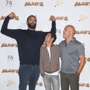 Ils se sont rencontrés il y a presque 30 ans. 
Ramzy Bedia, Jamel Debbouze et Eric Judor - Les célébrités posent lors du photocall de l'avant-première du film "Alad'2" au cinéma le grand Rex à Paris le 21 septembre 2018. © Guirec Coadic/Bestimage