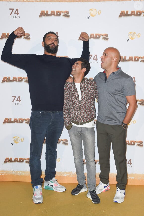Ils se sont rencontrés il y a presque 30 ans. 
Ramzy Bedia, Jamel Debbouze et Eric Judor - Les célébrités posent lors du photocall de l'avant-première du film "Alad'2" au cinéma le grand Rex à Paris le 21 septembre 2018. © Guirec Coadic/Bestimage