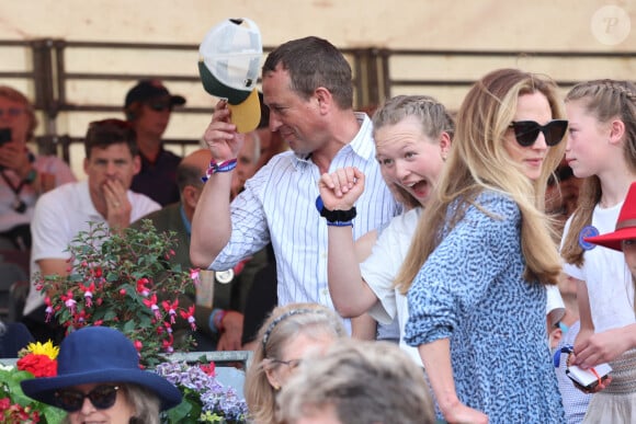 Celle-ci, nommée Harriet, est infirmière en pédiatrie. 
Reine Camilla, Peter Phillips, Isla Phillips, Savannah Phillips et Harriet assistent au dernier jour du Badminton Horse Trials dans le Gloucestershire pour le 75ème anniversaire de l'événement. 12 mai 2024