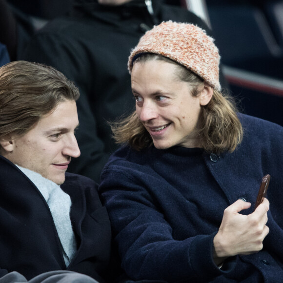 Pierre Sarkozy, Jean Sarkozy dans les tribunes lors du match de Champions League "PSG - Galatasaray (5-0)" au Parc des Princes à Paris, le 11 décembre 2019. © Cyril Moreau/Bestimage 