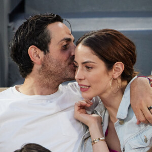 Camille Combal et sa femme Marie en tribunes lors des Internationaux de France de tennis de Roland Garros 2023, à Paris, France, le 6 juin 2023. © Jacovides-Moreau/Bestimage  People at the Village during the Roland Garros International Tennis Championships in Paris, France, on June 56h, 2023. 