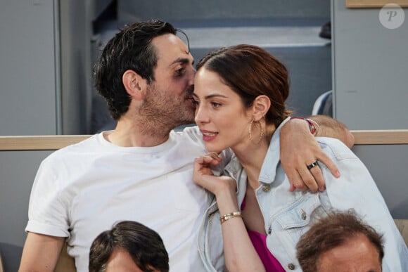 Camille Combal et sa femme Marie en tribunes lors des Internationaux de France de tennis de Roland Garros 2023, à Paris, France, le 6 juin 2023. © Jacovides-Moreau/Bestimage  People at the Village during the Roland Garros International Tennis Championships in Paris, France, on June 56h, 2023. 