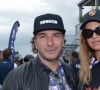 Il faut dire que la jeune femme a partagé leur vie à tous les deux. 
Michaël Youn et sa compagne Isabelle Funaro lors des "24H du Mans 2024", le 15 juin 2024. © Rachid Bellak/Bestimage 