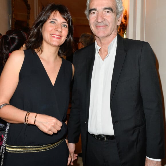 Raymond Domenech et sa compagne Estelle Denis lors de l'anniversaire des 10 ans de l'Etoile de Martin à l'hôtel Le Bristol à Paris. L'association soutient la recherche sur les cancers de l'enfant et offre des moments de plaisir et de détente à des enfants hospitalisés. Paris, le 30 mars 2017. © Guirec Coadic/Bestimage