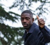 Ousmane Dembélé a partagé une photo de lui souriant, pour montrer sa joie suite aux résultats des élections
 
Ousmane Dembélé - Arrivée des joueurs de l'Equipe de France de football à Clairefontaine, le 29 mai 2024. © Baptiste Autissier / Panoramic / Bestimage