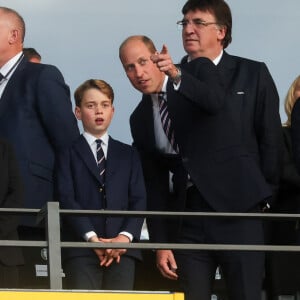 Le prince William, prince de Galles, avec le prince George de Galles, et le roi Felipe VI d'Espagne avec l'infante Sofia dans les tribunes lors de la finale de l'Euro 2024 "Espagne - Angleterre" à l'Olympiastadion à Berlin, le 14 juillet 2024. 