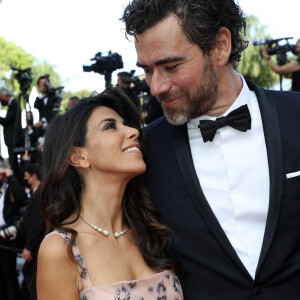 Reem Kherici et son mari Gilles Lemaire - Montée des marches du film " OSS 117 : Alerte rouge en Afrique Noire " lors du 74ème Festival International du Film de Cannes. Le 17 juillet 2021 © Borde-Jacovides-Moreau / Bestimage