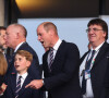 En plus d'avoir les mêmes looks, père et fils ont les mêmes expressions faciales selon l'expert royal Robert Jobson
Le prince William, prince de Galles, avec le prince George de Galles, et le roi Felipe VI d'Espagne avec l'infante Sofia dans les tribunes lors de la finale de l'Euro 2024 "Espagne - Angleterre" à l'Olympiastadion à Berlin, le 14 juillet 2024. 