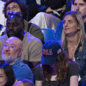 Ladji Doucouré et sa compagne assistent à la finale de l'épée individuellel homme avec le francais Yannick Borel qui perd en finale face à Kōki Kanō au Grand Palais lors des Jeux Olympiques de Paris 2024 (JO) à Paris le 28 juillet 2024. © Dominique Jacovides-Pierre Perusseau/Bestimage 