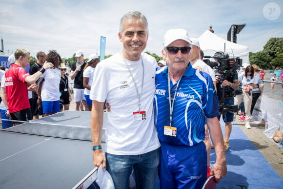 Jean-Philippe Gatien et Jacques Secrétin - Journée Paris 2024 sur la place de La Concorde à Paris le 23 juin 2019. La Concorde s'est transformée le temps d'une journée pour devenir un magnifique parc sportif urbain au coeur de Paris et inviter petits et grands, en famille, entre amis, à partager des moments inoubliables au contact des plus grands athlètes. © Cyril Moreau/Bestimage