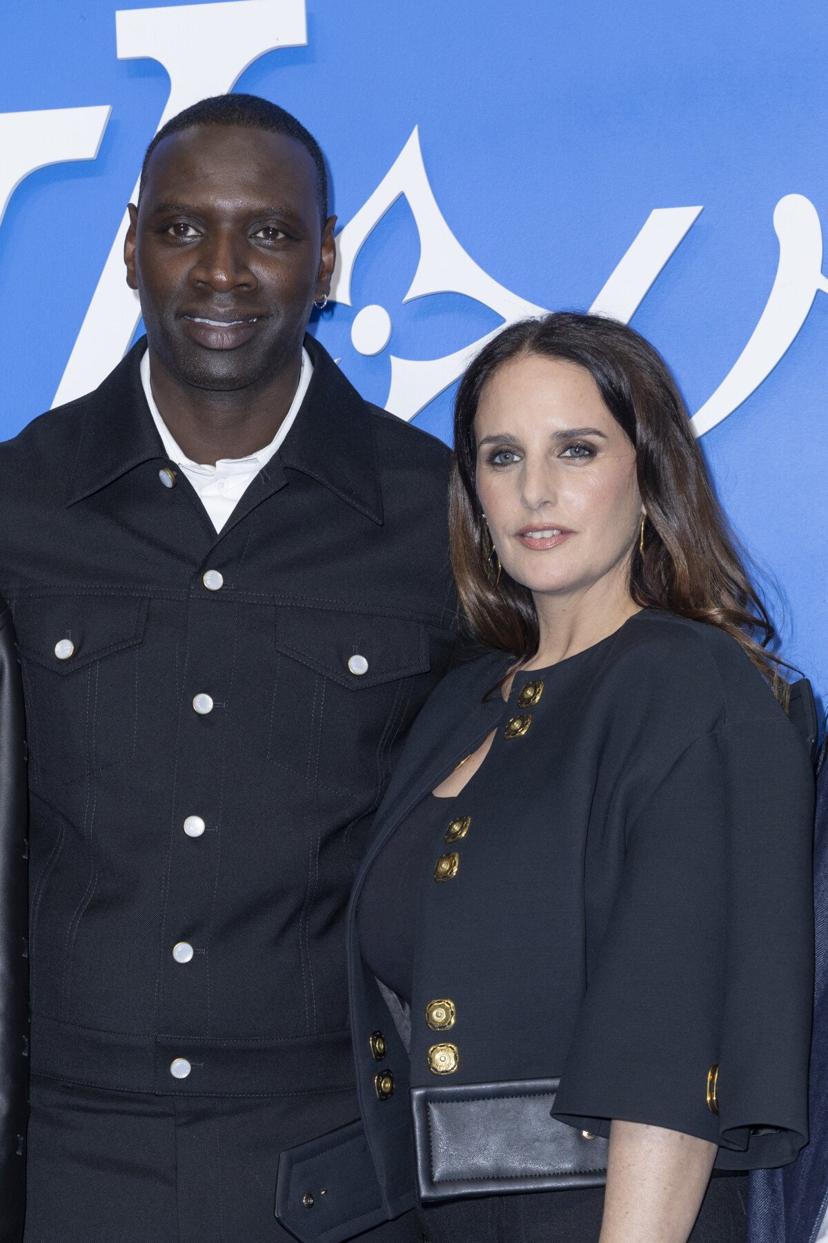 Photo Omar Sy, Hélène Sy au photocall du défilé Homme Louis Vuitton