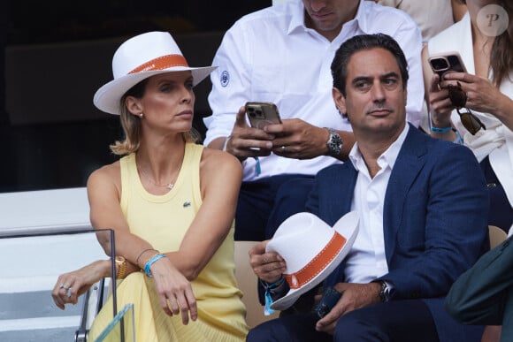 Sylvie Tellier et son mari Laurent Schenten - Célébrités dans les tribunes de la finale homme des Internationaux de France de tennis de Roland Garros 2024 à Paris le 9 juin 2024. © Jacovides-Moreau/Bestimage