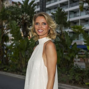 Cannes, FRANCE - Sylvie Tellier takes a stylish stroll along the Croisette during the Cannes Film Festival.