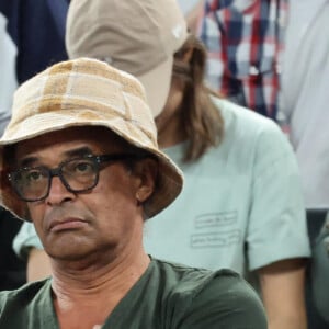 Yannick Noah et sa compagne Malika - Les célébrités en tribunes pendant l'épreuve de basketball de Demi-Finale opposant la France à l'Allemagne lors des Jeux Olympiques de Paris 2024 (JO) à l'Arena Bercy, à Paris, France, le 8 août 2024. © Jacovides-Perusseau/Bestimage 