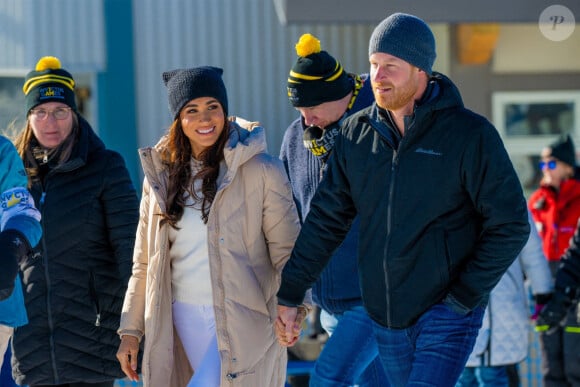 Le prince Harry, duc de Sussex et Meghan Markle, duchesse de Sussex, en visite au camp d'entrainement des athlètes des Invictus Games 2024 à Whistler en Colombie Britannique, le 14 février 2024