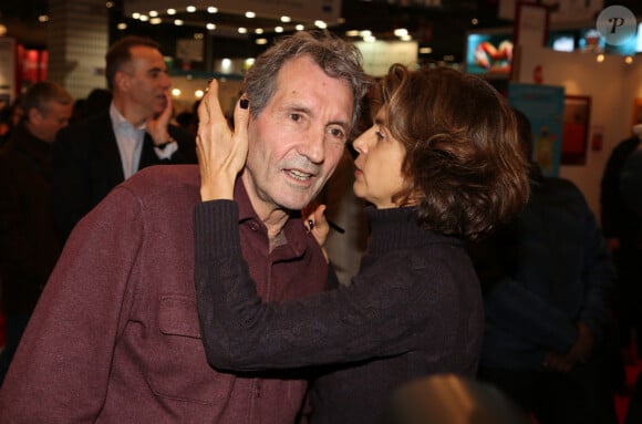 Jean-Jacques Bourdin et sa femme Anne Nivat lors du salon du livre de Paris le 17 Mars 2018 à la Porte de Versailles de Paris. © Denis Guignebourg/Bestimage