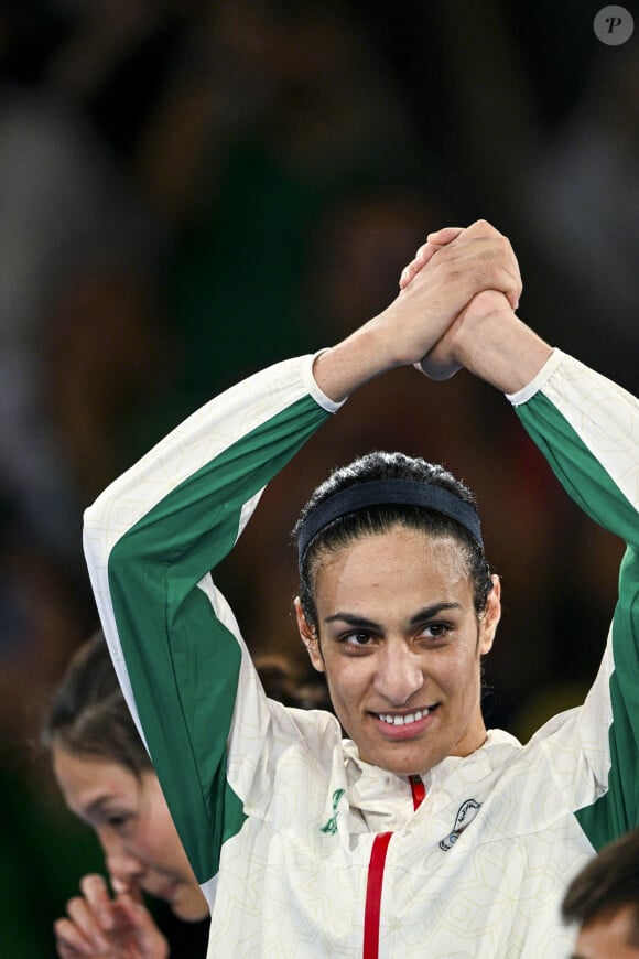 Imane Khelif devient championne olympique en -66 kg aux JO de Paris 2024, le 9 aout 2024. L'Algérienne Imane Khelif, dont la féminité a été remise en question, devient championne olympique en - 66 kg, en battant la Chinoise Y.Liu, en finale aux Jeux Olympiques de Paris2024 (JO), le 9 août 2024. © Jacovides-Perusseau / Bestimage 