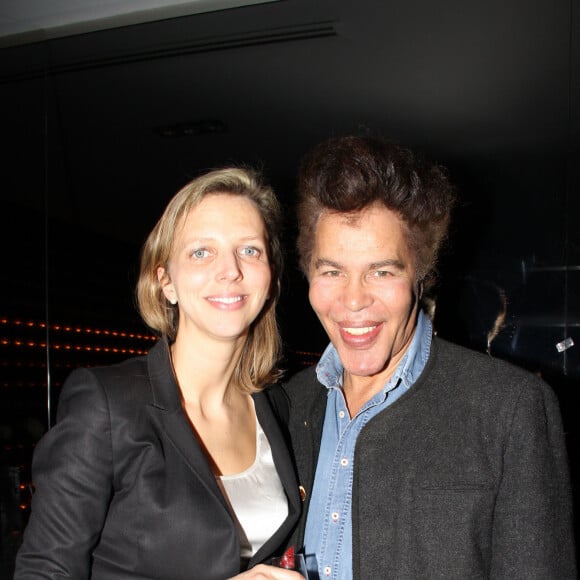 Igor Bogdanoff ( Bogdanov) ( Bogdanov) et sa femme Amélie de Bourbon Parme dans le bar restaurant le "Who's" dans le Marais à Paris le 19 février 2014.