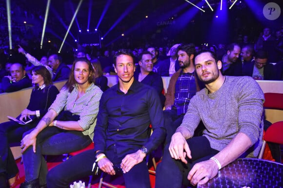 Laure Manaudou, Frédérick Bousquet (ex compagnon de laure Manaudou, ils sont parents d'une petite Manon née en 2010), Jérémy Frérot, son compagnon (en arrière plan, barbu) et son frère à droite, Florent Manaudou lors du gala de boxe organisé par Univent Production au Palais des Sports de Marseille le 24 mars 2018. © Bruno Bebert/Bestimage