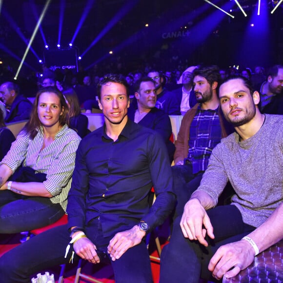 Laure Manaudou, Frédérick Bousquet (ex compagnon de laure Manaudou, ils sont parents d'une petite Manon née en 2010), Jérémy Frérot, son compagnon (en arrière plan, barbu) et son frère à droite, Florent Manaudou lors du gala de boxe organisé par Univent Production au Palais des Sports de Marseille le 24 mars 2018. © Bruno Bebert/Bestimage