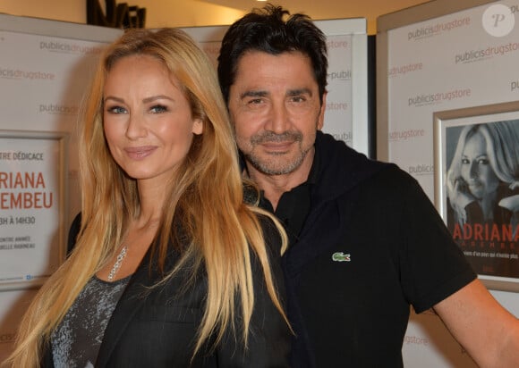 Adriana Karembeu et Aram Ohanian lors de la dédicace de son livre "Je viens d'un pays qui n'existe plus" à la librairie du Publicis Drugstore à Paris, le 25 septembre 2014.