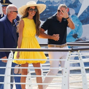 Venise, ITALIE - George Clooney et sa femme Amal arrivent à l'aéroport Marco Polo de Venise pour la 81e édition du Festival international du film de Venise.