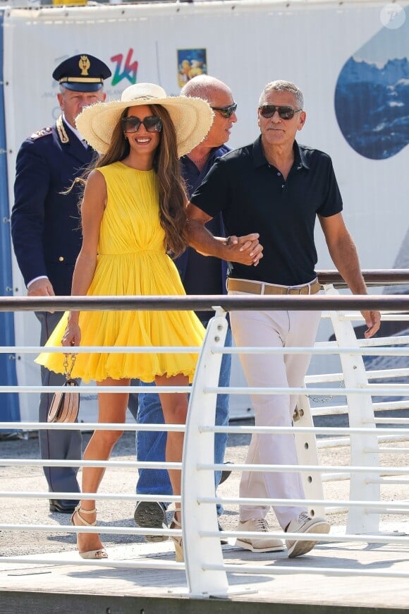 Venise, ITALIE - George Clooney et sa femme Amal arrivent à l'aéroport Marco Polo de Venise pour la 81e édition du Festival international du film de Venise.