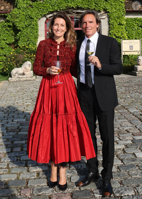 Anne-Claire Coudray et son compagnon Nicolas Vix lors de la fête de la fleur et l'intronisation de personnalités commandeurs et ambassadeurs par la Commanderie du Bontemps au Château Smith Haut Lafitte à Martillac le 27 avril 2023.  © Fabien Cottereau / Patrick Bernard / Bestimage 