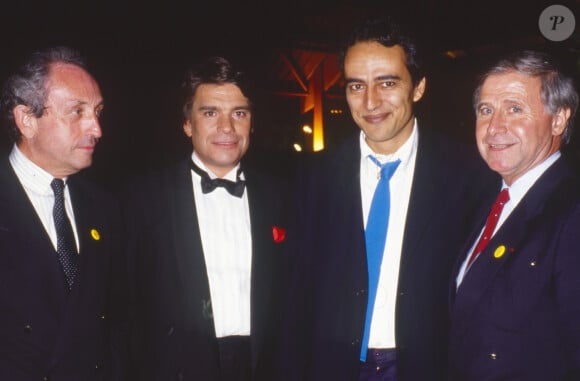 Archives - Bernard Tapie, Didier Roustan et Michel Hidalgo - Soirée de privatisation de la chaîne TF1 à Paris. Le 15 avril 1987