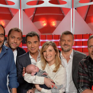 Xavier Gravelaine, Emmanuel Petit, Didier Roustan, Éric Naulleau, Louise Ekland et son fils Sacha ainsi que Laurent Luyat sur le plateau de 'Cote Match' le 27 septembre 2013 à Paris, France. Photo by Max Colin/ABACAPRESS.COM