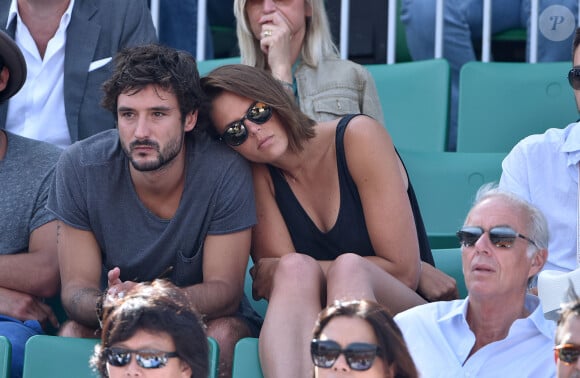 Laure Manaudou et son ex-compagnon Jérémy Frérot (du groupe Fréro Delavega) dans les tribunes lors de la finale des Internationaux de tennis de Roland-Garros à Paris, le 7 juin 2015.