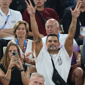 Laure Manaudou et Florent Manaudou - Les célébrités en tribunes pendant l'épreuve de basketball de Demi-Finale opposant la France à l'Allemagne lors des Jeux Olympiques de Paris 2024 (JO) à l'Arena Bercy, à Paris, France, le 8 août 2024. © Jacovides-Perusseau/Bestimage 