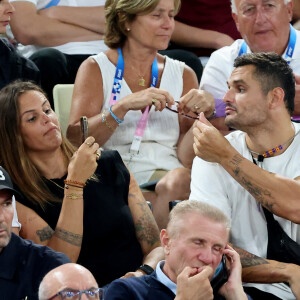 Laure Manaudou, Florent Manaudou en tribunes pendant l'épreuve de basketball de Demi-Finale opposant la France à l'Allemagne lors des Jeux Olympiques de Paris 2024 (JO) à l'Arena Bercy, à Paris, France, le 8 août 2024. © Jacovides-Perusseau/Bestimage 