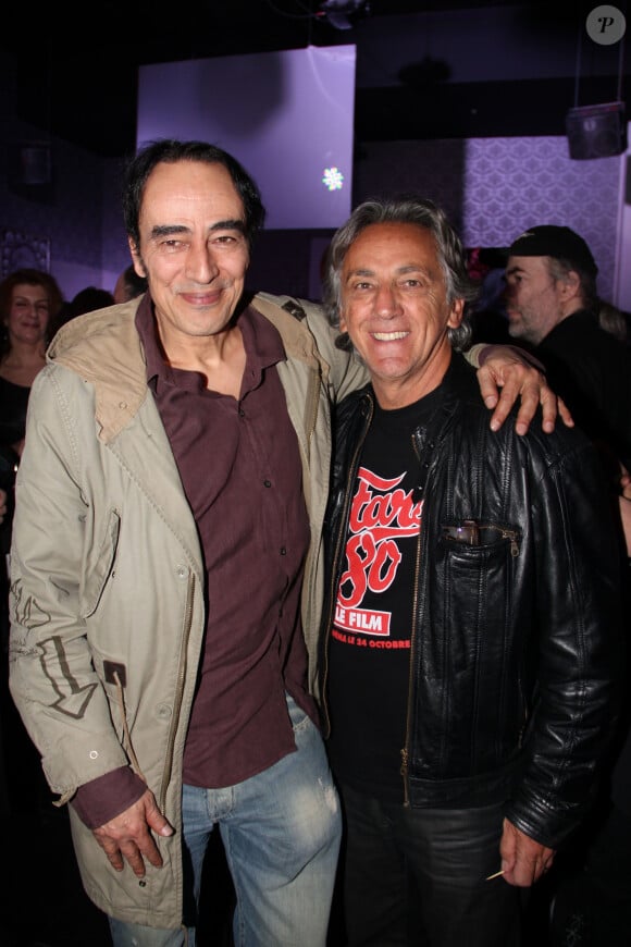 Didier Roustan, Jean-Pierre Savelli - Exclusif - Prix special - Soiree des 80 ans de Michel Hidalgo (ancien selectionneur de l'equipe de France de football) au Palais Maillot a Paris le 25 mars 2013.