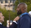 Emmanuel Macron, président de la République Française, Teddy Riner - La "Parade des Champions" des Jeux Olympiques et Paralympiques de Paris2024, sur les Champs-Elysées. Paris, le 14 septembre 2024. © Eric Tschaen/Pool/Bestimage 