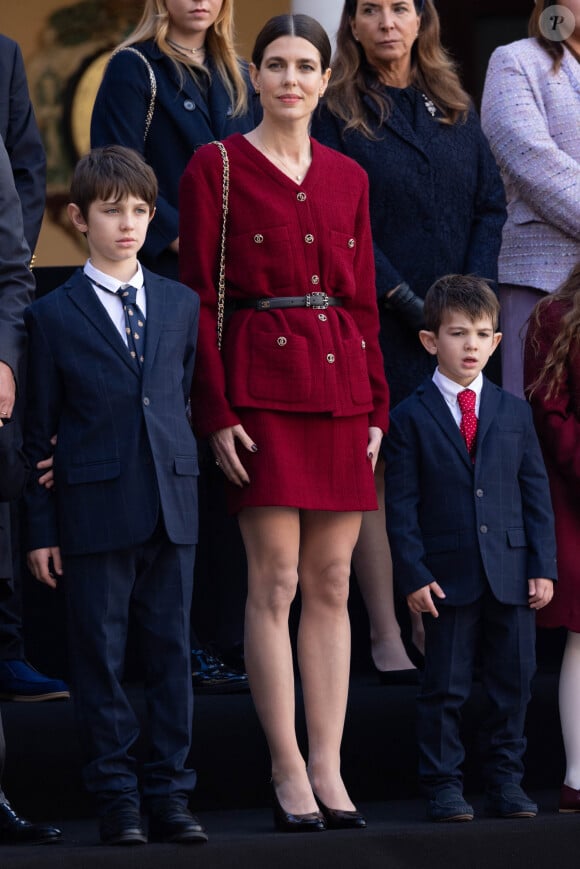 Charlotte Casiraghi et ses fils Raphaël Elmaleh et Balthazar Rassam - La famille princière monégasque dans la cour d'honneur du palais lors de la la fête nationale à Monaco, le 19 novembre 2023. La famille princière monégasque assiste à la prise d'armes, puis à la cérémonie de remise des médailles et à un défilé militaire sur la place du palais princier. © Olivier Huitel / Pool Monaco / Bestimage 