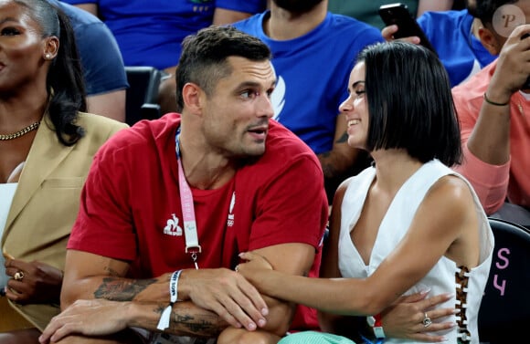 Florent Manaudou et sa compagne Lola Duménil - Les célébrités assistent à la victoire de l'équipe de France de basket face au Canada (82-73) lors des Jeux Olympiques de Paris2024, le 6 août 2024. © Jacovides-Perusseau / Bestimage