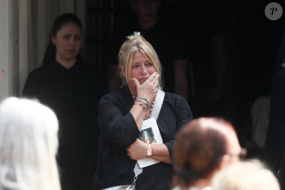 Marina Carrère d'Encausse (Fille de la défunte) - Sorties des obsèques de l'académicienne Hélène Carrère d'Encausse en l'église Saint-Germain-des-Près à Paris. Le 11 août 2023 