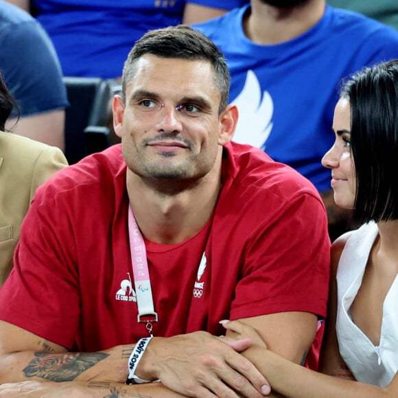 Florent Manaudou bientôt papa ? 
 
Florent Manaudou et sa compagne Lola Duménil - Les célébrités assistent à la victoire de l'équipe de France de basket face au Canada (82-73) lors des Jeux Olympiques de Paris. © Jacovides-Perusseau / Bestimage