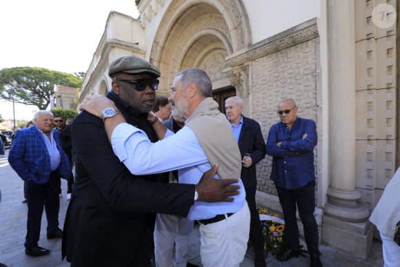 Basile Boli - Obsèques du journaliste sportif, Didier Roustan, décédé le 11 septembre à l'âge de 66 ans en l'église Notre-Dame-des-Pins, à Cannes le 20 septembre 2024. © Franz Chavaroche/Bestimage