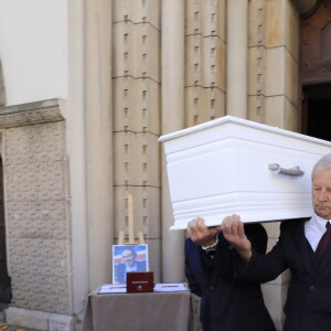 Sorties des obsèques du journaliste sportif, Didier Roustan, décédé le 11 septembre à l'âge de 66 ans en l'église Notre-Dame-des-Pins, à Cannes le 20 septembre 2024. © Franz Chavaroche/Bestimage
